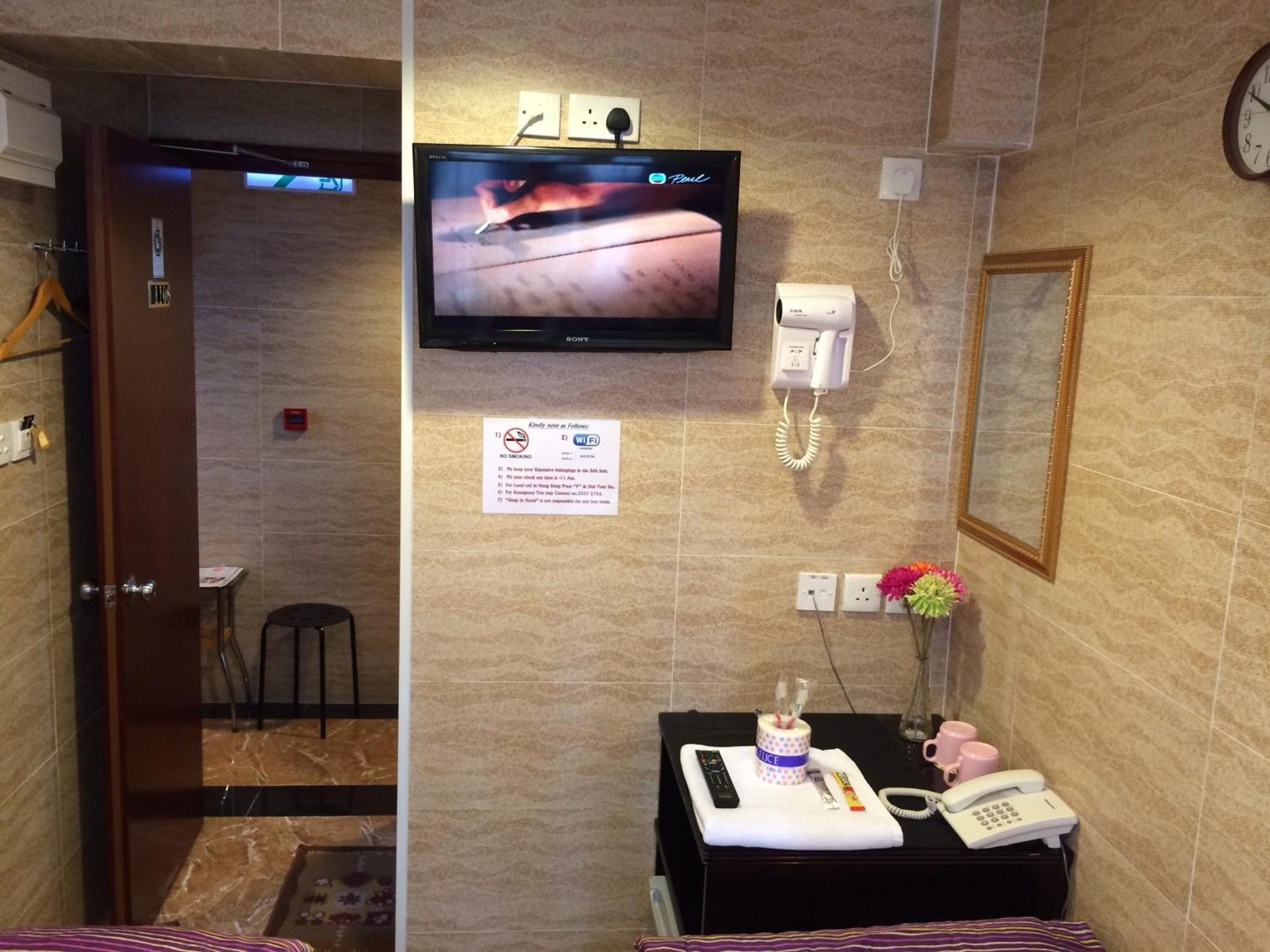 Sleep Inn Hongkong Rum bild